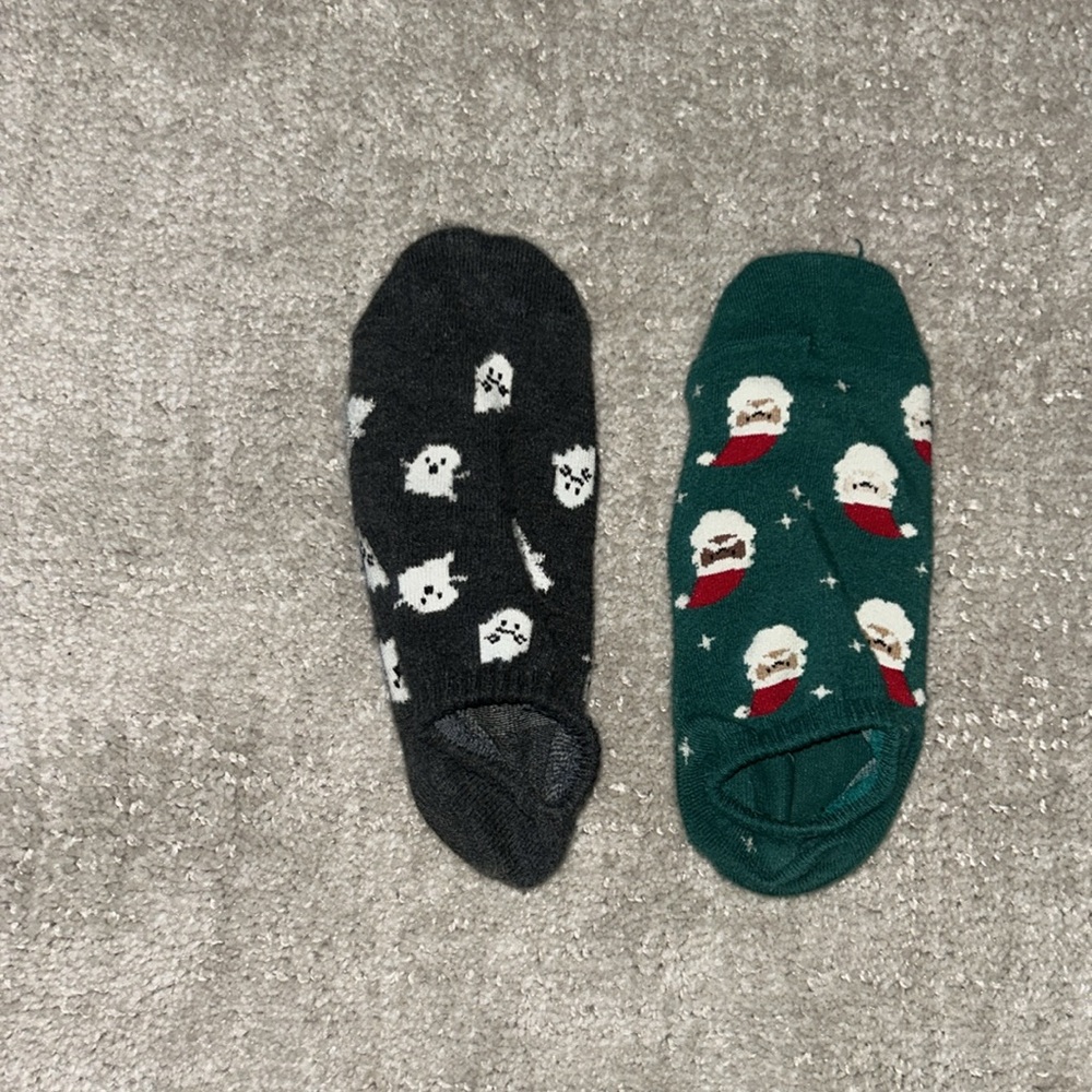 Very worn Festive Santa and Ghost Socks